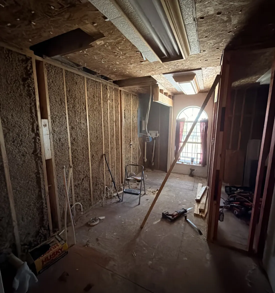 Room gutted to bare studs