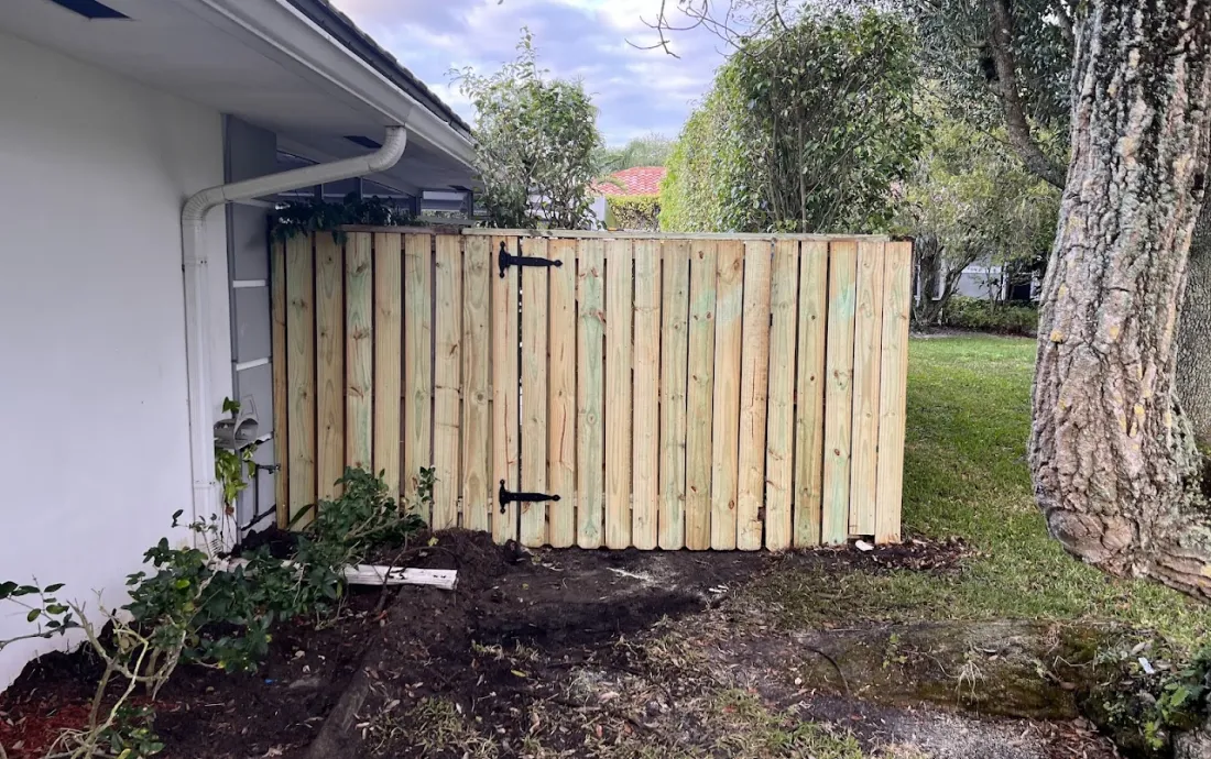 New wood privacy fence with gate