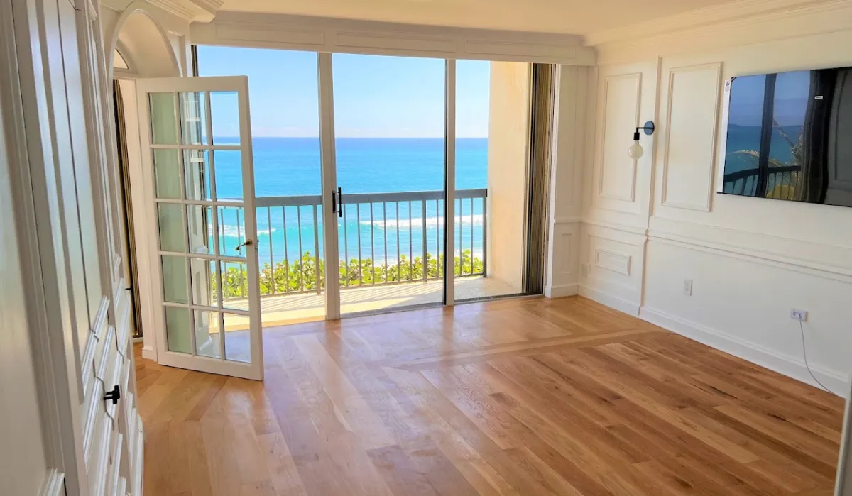 Finished bright living space with wood floors